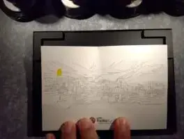 alt="スタンプラリーのスタンプと台紙”