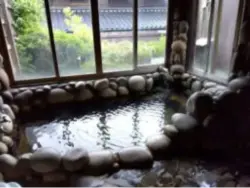 alt="丸い石で囲まれた「ゆふ」"